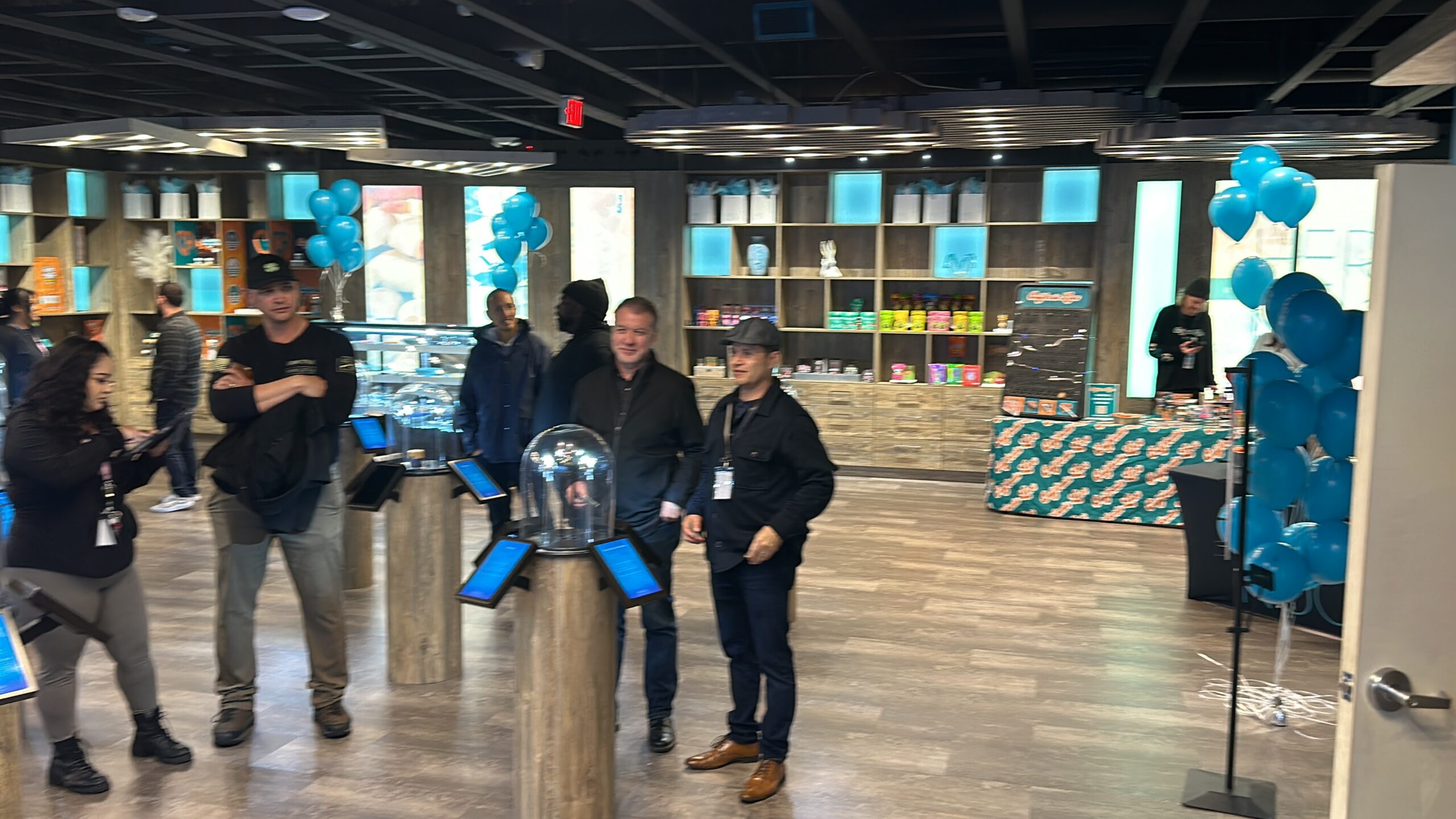 people visiting the HerbNJoy Dispensary during an event